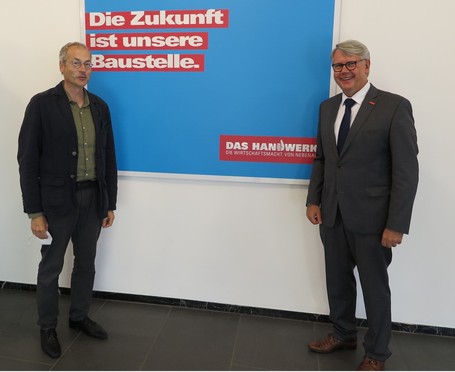 Dr. Stephan Nonhoff, Bezirksbürgermeister Münster-Mitte (l.), und HWK-Hauptgeschäftsführer Thomas Banasiewicz (r.)